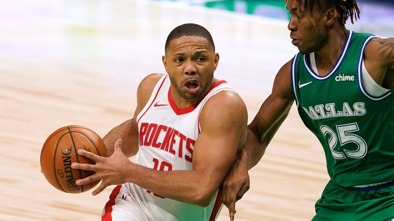 Houston Rockets&#39; Eric Gordon (10) drives to the basket against Dallas Mavericks&#39; Wes Iwundu (25) during an NBA basketball game in Dallas, Saturday, Jan. 23, 2021.