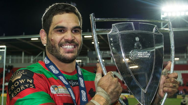 Picture by Allan McKenzie/SWpix.com - 22/02/2015 - Rugby League - World Club Series - St Helens v South Sydney Rabbitohs - Langtree Park , St Helens, England - South Sydney Rabbitohs's Greg Inglis celebrates with the World Club Challenge trophy.