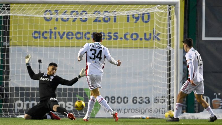 Ross Callachan (centre) scores to make it 2-0 Hamilton during a Scottish Premiership match between Hamilton and Motherwell 