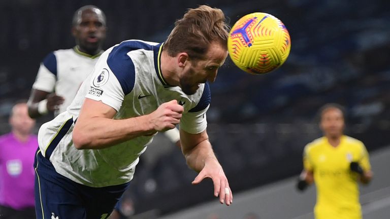 Harry Kane heads Tottenham in front against Fulham
