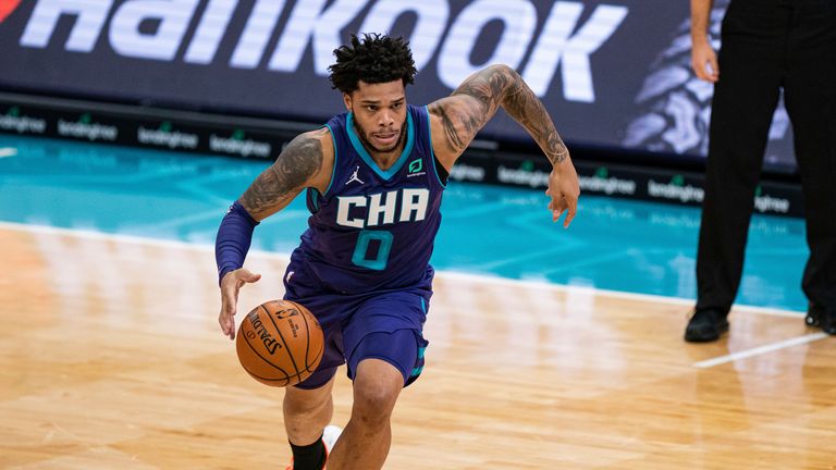 Charlotte Hornets forward Miles Bridges brings the ball up court