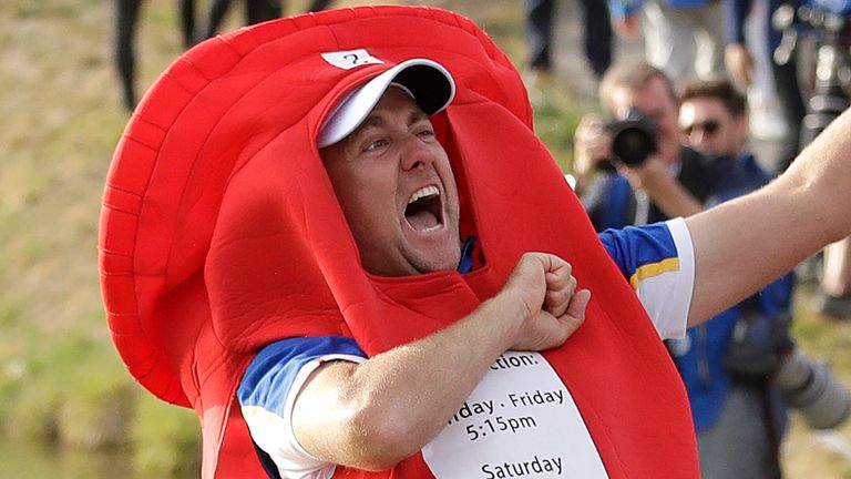 Europe's Ian Poulter celebrates after Europe won the Ryder Cup on the final day of the 42nd Ryder Cup at Le Golf National in Saint-Quentin-en-Yvelines, outside Paris, France, Sunday, Sept. 30, 2018. Europe won by 17 1/2 to 10 1/2. (AP Photo/Matt Dunham)