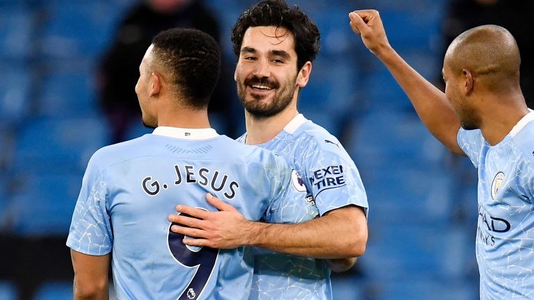 Ilkay Gundogan celebrates with Gabriel Jesus after scoring Man City's second (AP)