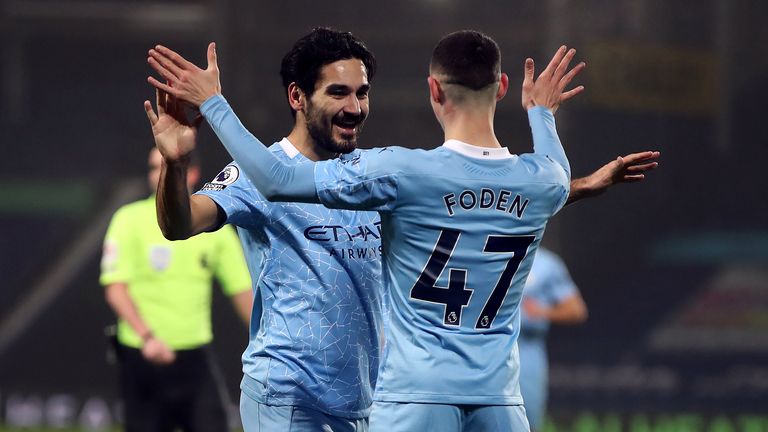 Ilkay Gundogan celebrates scoring his second, Man City's third goal of the game