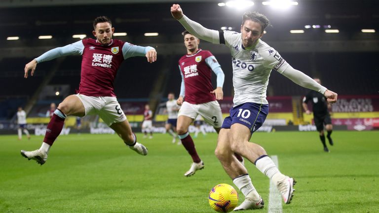 Jack Grealish and Burnley's Josh Brownhill in Premier League action at Turf Moor