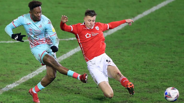 Jamal Lowe scores Swansea's second goal at Barnsley