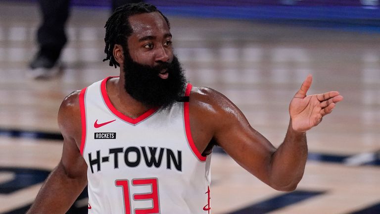 Houston Rockets' James Harden (13) drives up court during the first half of an NBA conference semifinal playoff basketball game against the Los Angeles Lakers Friday, Sept. 4, 2020, in Lake Buena Vista, Fla. (AP Photo/Mark J. Terrill)