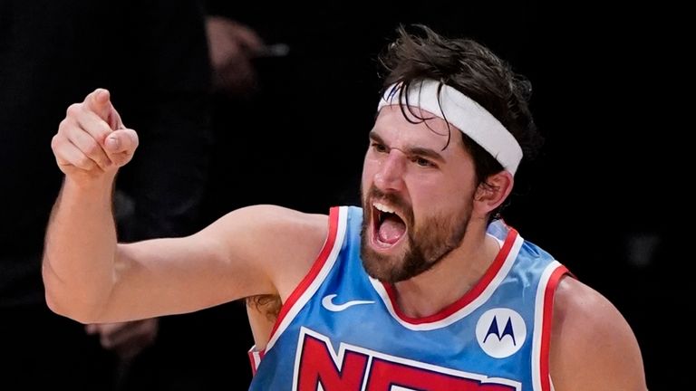 Brooklyn Nets&#39; Joe Harris reacts after making a three-pointer during the first half against the Philadelphia 76ers. (AP Photo/Frank Franklin II)
