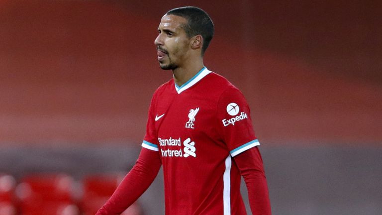 Liverpool's Joel Matip leaves the pitch after picking up an injury