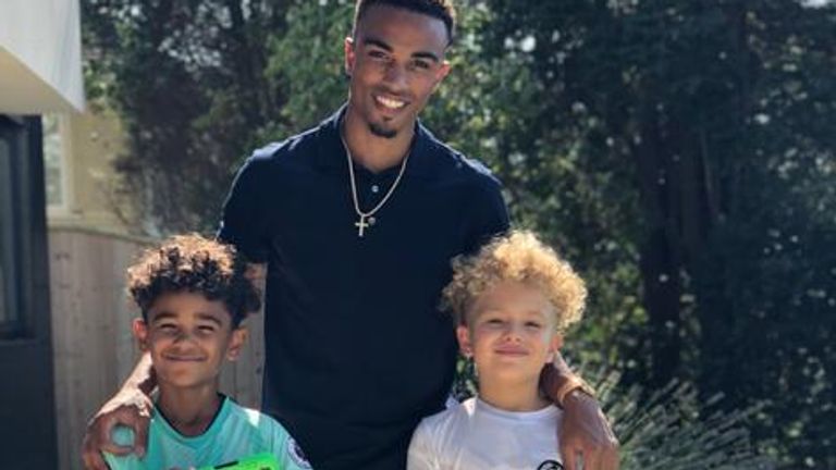 Junior Stanislas pictured with his twin sons (Photo used by permission of Junior Stanislas)
