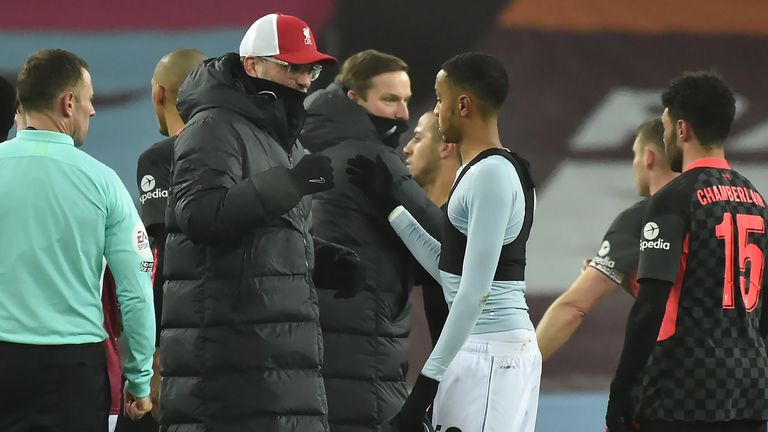 Jurgen Klopp congratulates the Aston Villa players at the final whistle