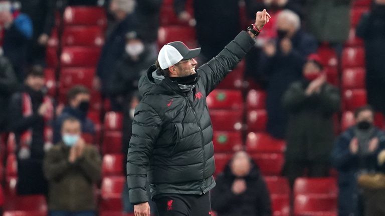 Jurgen Klopp gestures to the fans at Anfield - PA