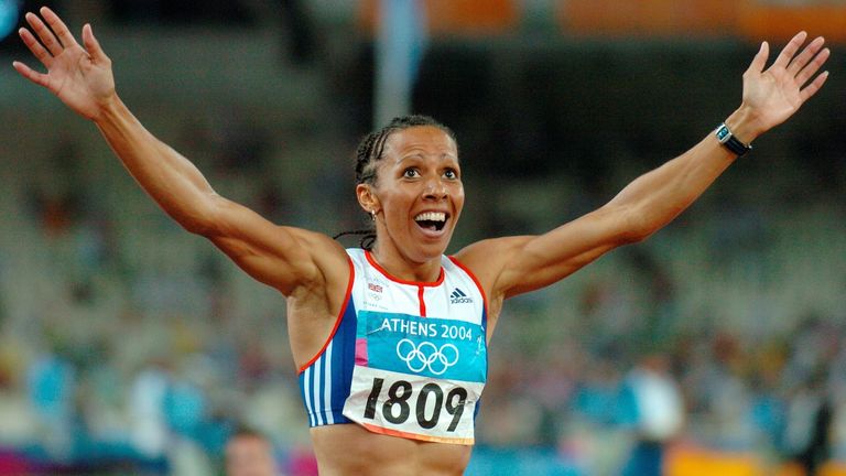 Kelly Holmes from Great Britain jubilates as she crosses the finish line first to win the gold medal in the women's 800m at the 2004 Olympic Games in Athens, Greece, 23 August 2004. 