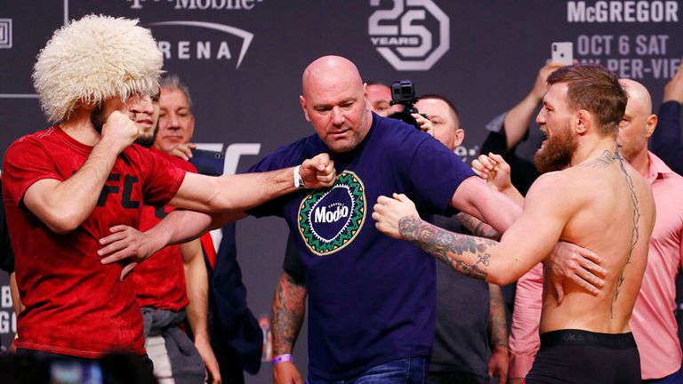 AP - Dana White, center, keeps Khabib Nurmagomedov, left, and Conor McGregor away from each other during a ceremonial weigh-in for the UFC 229 
