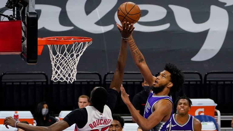 Sacramento Kings forward Marvin Bagley III goes to the basket against Toronto Raptors forward Chris Boucher