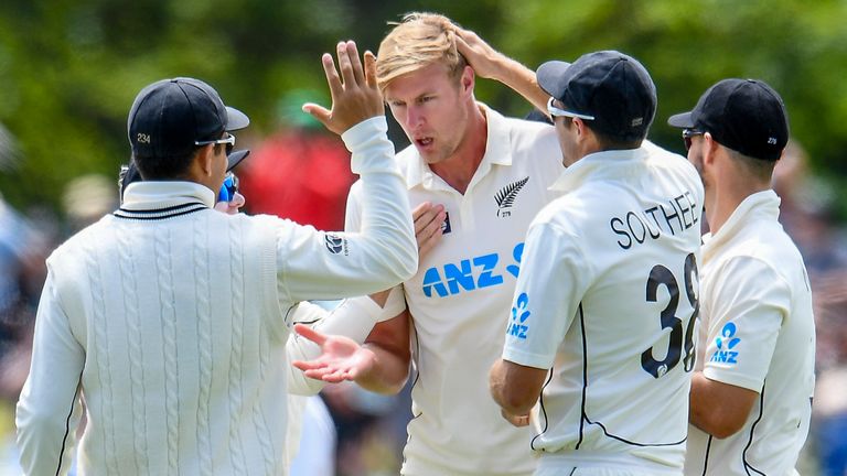 New Zealand bowler Kyle Jamieson, centre, is congratulated by teammates after dismissing Pakistan's Mohammad Rizwan, right, during play on day four of the second Test between Pakistan and New Zealand at Hagley Oval, Christchurch, New Zealand, Wednesday, Jan 6. 2021. New Zealand defeated Pakistan by an innings and 176-runs to win the two test series 2-0. (John Davidson/Photosport via AP)