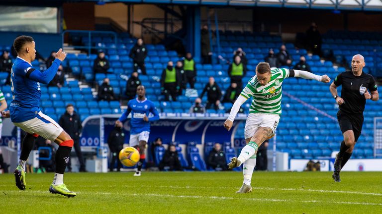 Leigh Griffiths comes close with his shot tipped onto the post