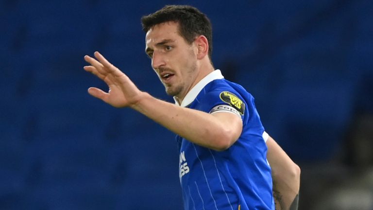 Lewis Dunk celebrates the equaliser for Brighton