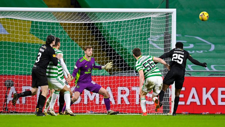 Efe Ambrose (right) missed a close-range header for Livingston against his former club in their Celtic Park stalemate