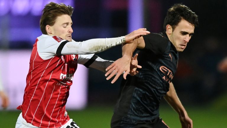 Eric Garcia is challenged by Cheltenham&#39;s Alfie May 