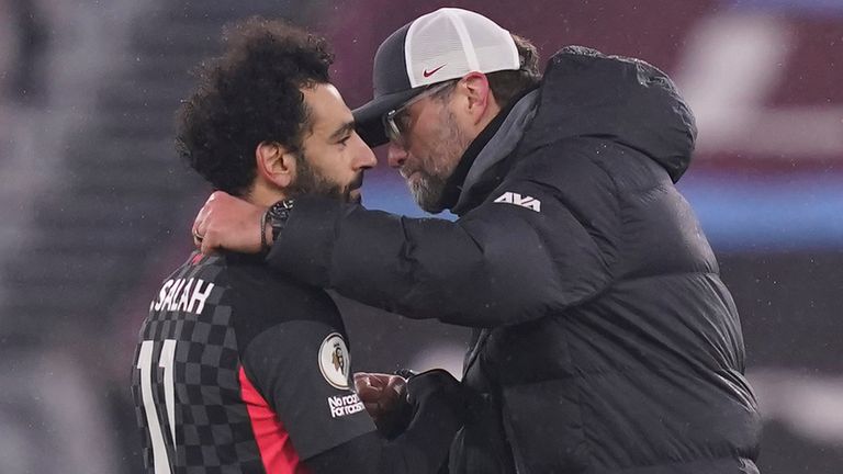 Mo Salah and Jurgen Klopp, AP