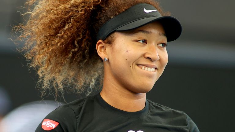 Japan's Naomi Osaka reacts during her match against United States' Serena Williams at an exhibition tennis event in Adelaide, Australia, Friday, Jan 29. 2021. (Kelly Barnes/AAP Image via AP)                                                  