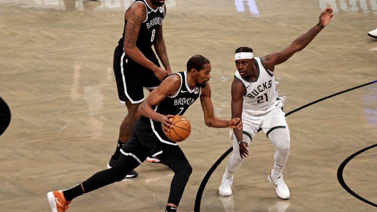 Brooklyn Nets forward Kevin Durant (7) in action during the first half of an NBA basketball game against the Milwaukee Bucks, Monday, Jan. 18, 2021, in New York. (AP Photo/Adam Hunger)


