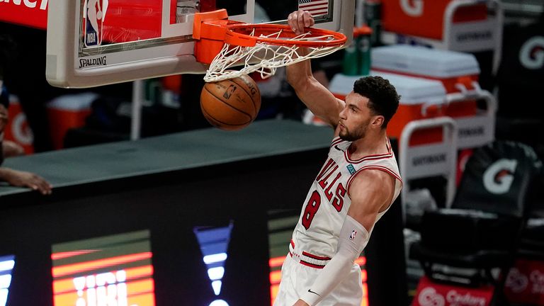 Chicago Bulls guard Zach LaVine scores on a breakaway dunk during the first half of an NBA basketball game against the Los Angeles Clippers Sunday, Jan. 10, 2021, in Los Angeles. (AP Photo/Marcio Jose Sanchez)


