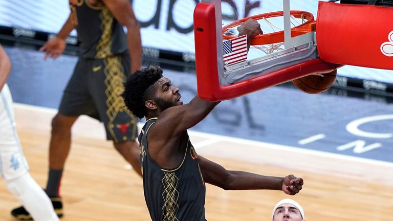 Chicago Bulls forward Patrick Williams dunks against the Los Angeles Lakers during the first half of an NBA basketball game in Chicago, Saturday, Jan. 23, 2021.