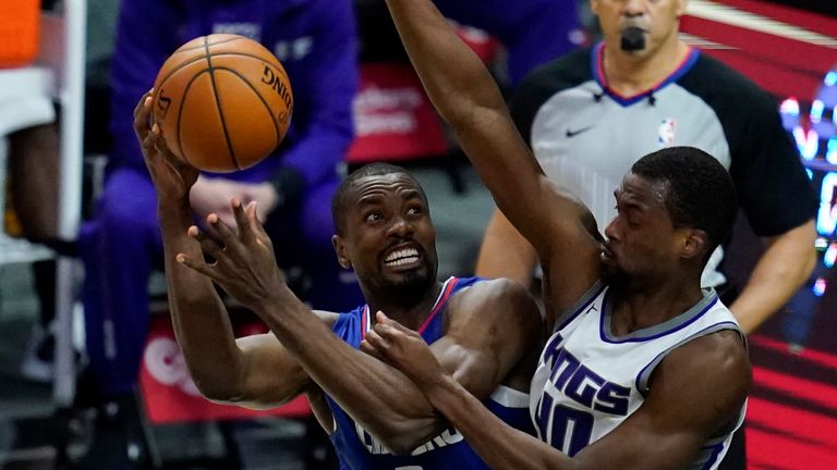 Sacramento Kings forward Harrison Barnes (40) defends against Los Angeles Clippers center Serge Ibaka (9) during the fourth quarter of an NBA basketball game Wednesday, Jan. 20, 2021, in Los Angeles.