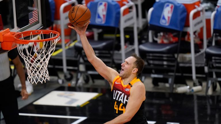 Utah Jazz forward Bojan Bogdanovic lays the ball up during the second half of the team&#39;s NBA basketball game against the Dallas Mavericks on Friday, Jan. 29, 2021, in Salt Lake City. (AP Photo/Rick Bowmer)


