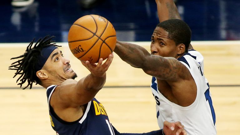 Denver Nuggets guard Gary Harris shoots against Minnesota Timberwolves center Ed Davis (17) in the fourth quarter during an NBA basketball game, Sunday, Jan. 3, 2021, in Minneapolis. (AP Photo/Andy Clayton-King)


