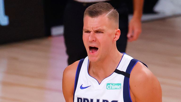 Dallas Mavericks&#39; Kristaps Porzingis reacts to a call and receives a technical foul during the second quarter of Game 1 of an NBA basketball first-round playoff series against the Los Angeles Clippers, Monday, Aug. 17, 2020, in Lake Buena Vista, Fla.