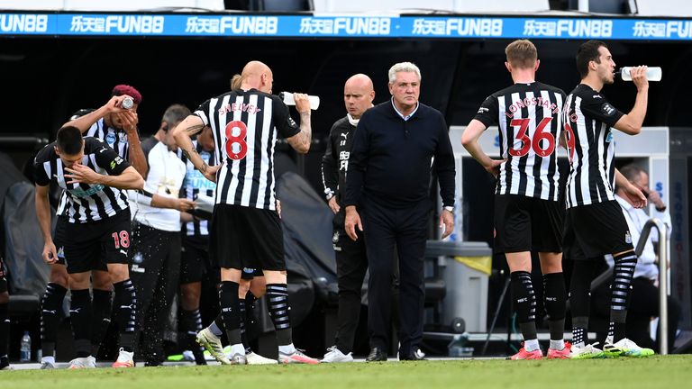 Newcastle players take a drinks break