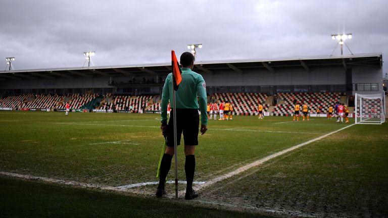 Newport County v Salford City - Sky Bet League Two - Rodney Parade
An assistant referee keeps an eye on the action during the Sky Bet League Two match at Rodney Parade, Newport.