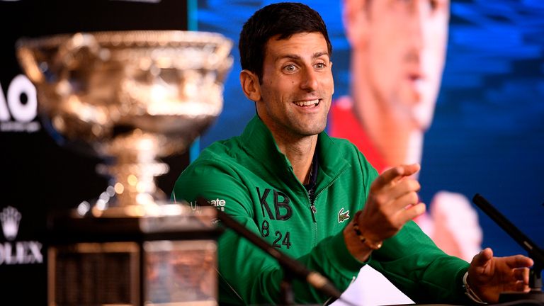 Serbia's Novak Djokovic reacts as he addresses a press conference after defeating Austria's Dominic Thiem to win the men's singles final at the Australian Open tennis championship in Melbourne, Australia, Monday, Feb. 3, 2020