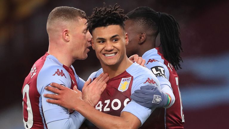 Ollie Watkins celebrates his opening goal with team-mates Ross Barkley and Bertrand Traore 