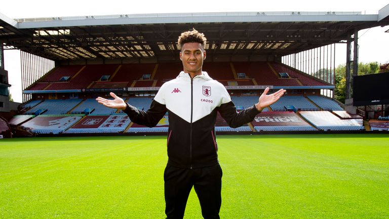 Watkins in front of the Holte End after signing for Villa