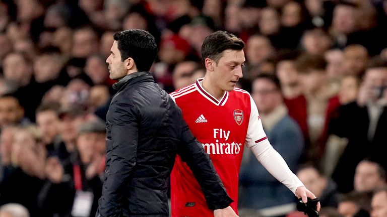 Mikel Arteta and Mesut Ozil