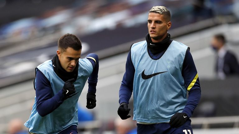 PA - Sergio Reguilon (left) and Erik Lamela pictured warming up for Tottenham Hotspur