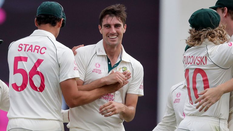 Pat Cummins celebrates taking a wicket against India (Associated Press)
