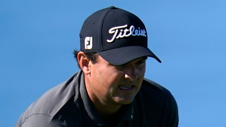 Patrick Reed lines up a putt on the fourth hole of the South Course during the third round of the Farmers Insurance Open golf tournament at Torrey Pines Saturday, Jan. 30, 2021, in San Diego. (AP Photo/Gregory Bull)