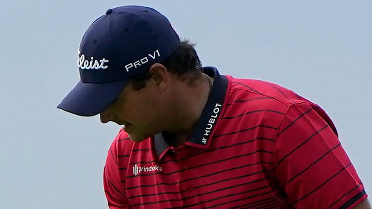 Patrick Reed reacts after making his putt for par on the 14th hole on the South Course during the final round of the Farmers Insurance Open golf tournament at Torrey Pines, Sunday, Jan. 31, 2021, in San Diego. (AP Photo/Gregory Bull)