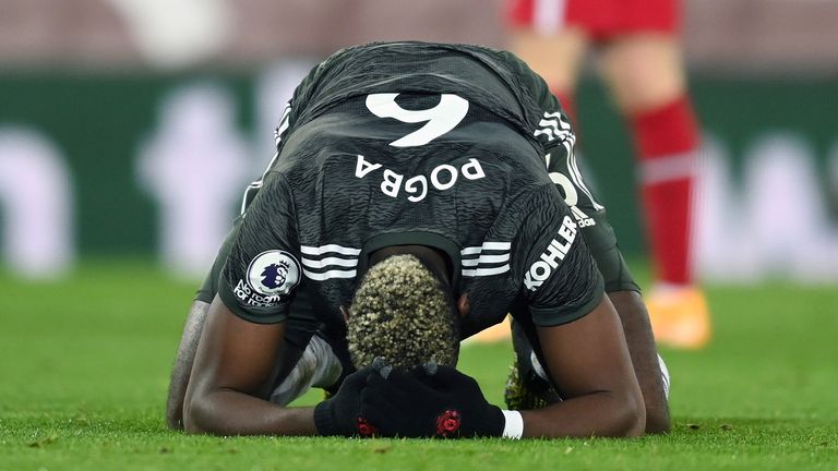 Manchester United&#39;s Paul Pogba reacts after a missed chance during the Premier League match at Anfield, Liverpool.