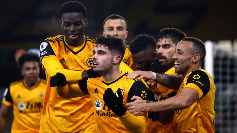 Pedro Neto is congratulated by his team-mates after his winner for Wolves against Chelsea