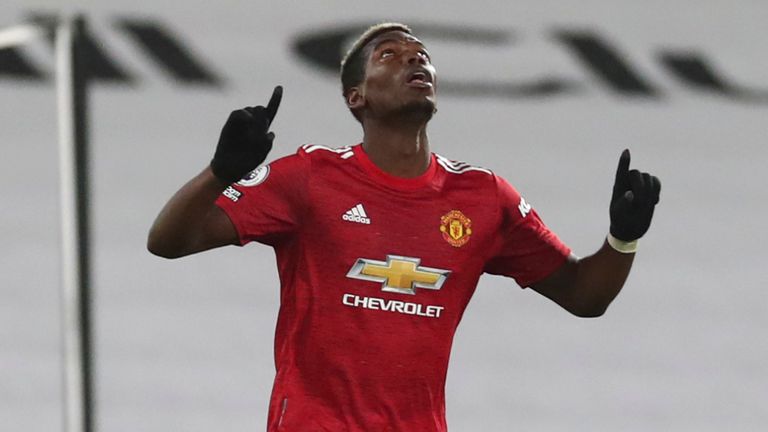 Manchester United&#39;s Paul Pogba, centre, celebrates after scoring his side&#39;s second goal during the English Premier League soccer match between Fulham and Manchester United at the Craven Cottage stadium in London, Wednesday, Jan. 20, 2021.