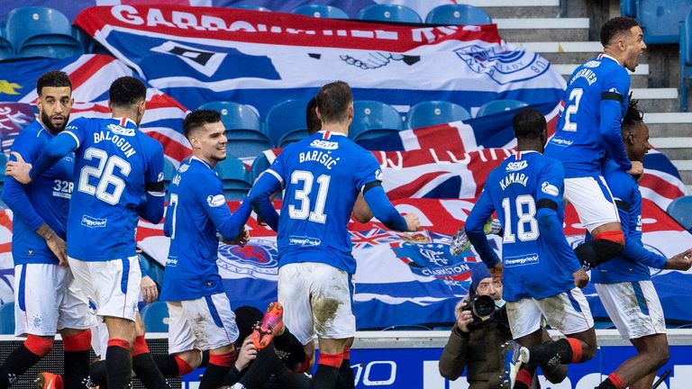 Rangers' celebrate going 1-0 up through Callum McGregor's own goal