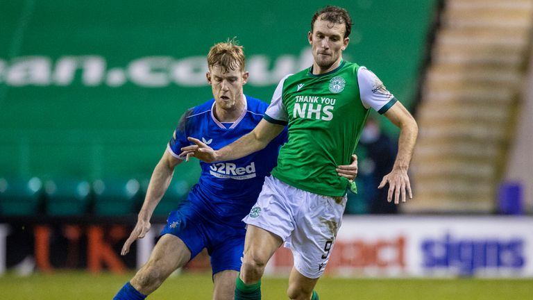 Rangers' Filip Helander (left) battles with Hibernian's Christian Doidge 