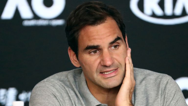 Switzerland's Roger Federer speaks during a press conference following his semifinal loss to Serbia's Novak Djokovic at the Australian Open tennis championship in Melbourne, Australia, Thursday, Jan. 30, 2020. (AP Photo/Dita Alangkara)