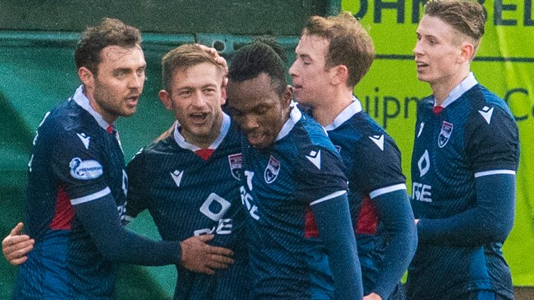 Ross County's Charlie Lakin (second from left) celebrates after he makes it 2-0 during a Scottish Premiership match between Ross County and Aberdeen at The Global Energy Stadium